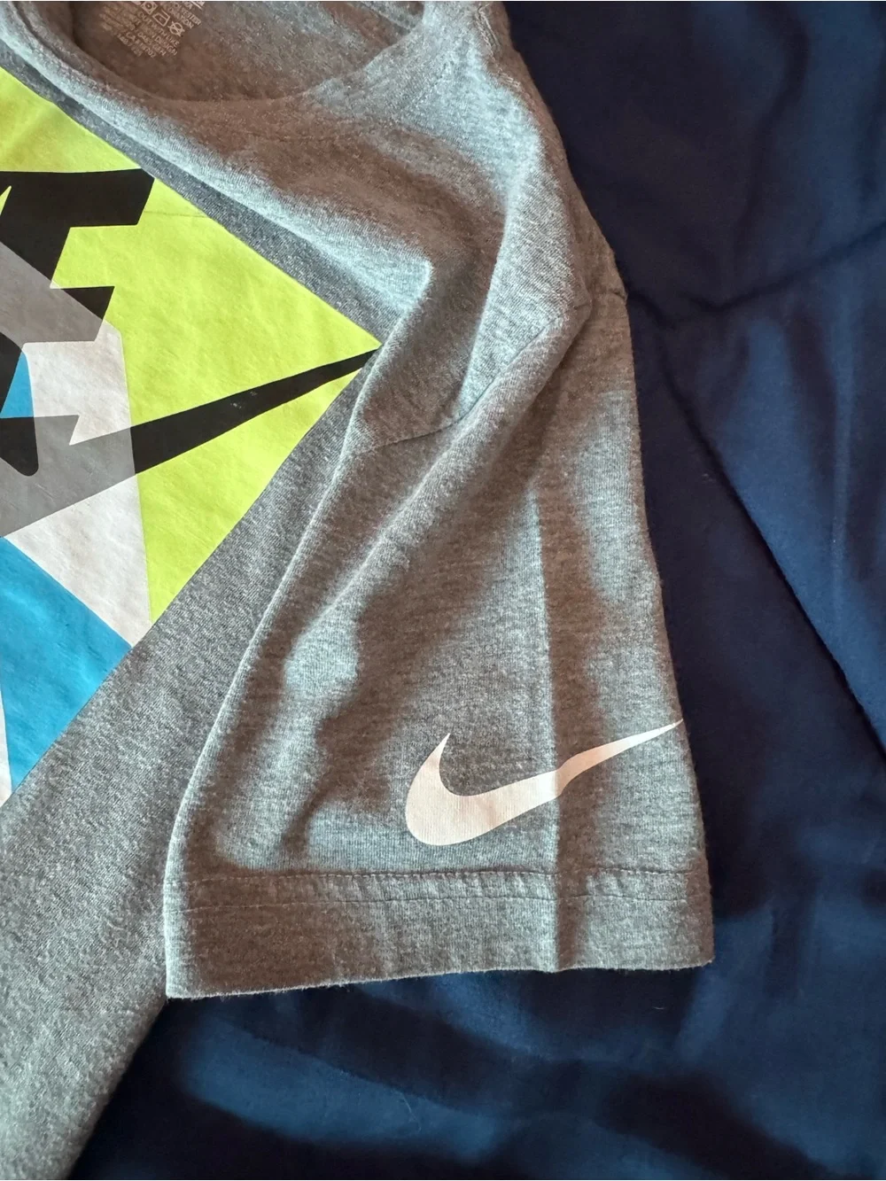 Nike Youth Gray Graphic Tee with Blue & Neon Accents